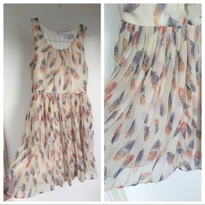 *Flowy feather pleated skirt lined dress